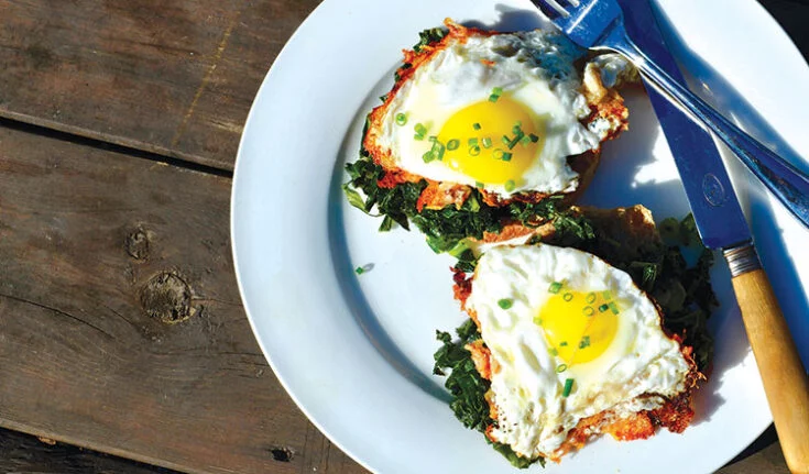 Parmesan eggs and wilted kale