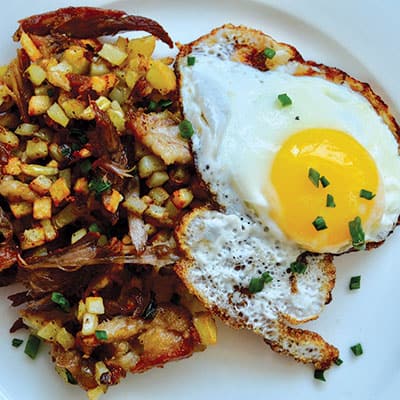 Simple shredded duck hash and eggs