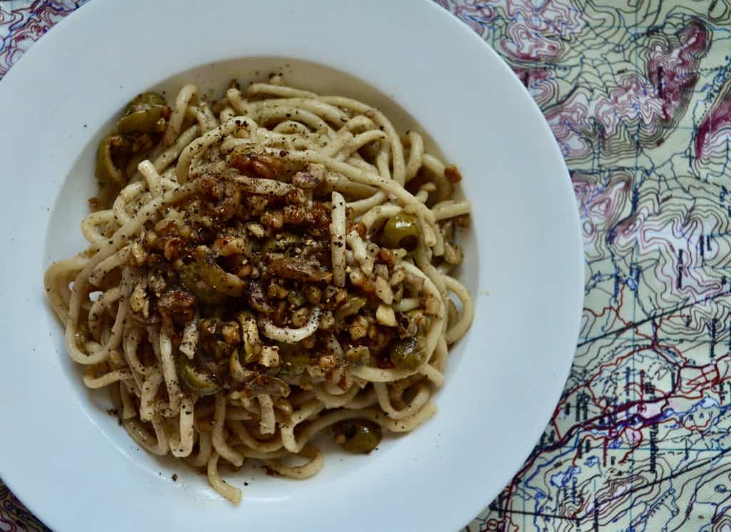 Bucatini with walnuts, green olives and lemon