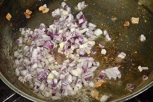 red onions in bacon fat.