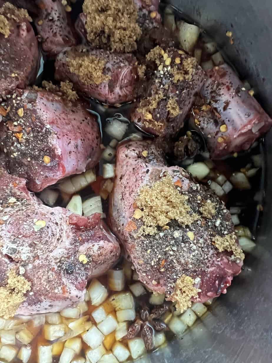 Oxtails before an hour in the pressure cooker