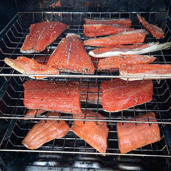 Fish loaded into a smoker