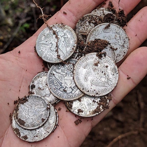 This cache of 19th- and 20th-century coins was found about a metre underground on the side of the Dome