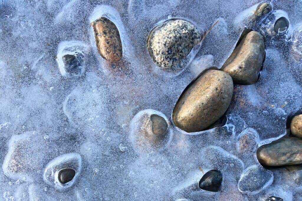 Rocks along the frozen lakeshore