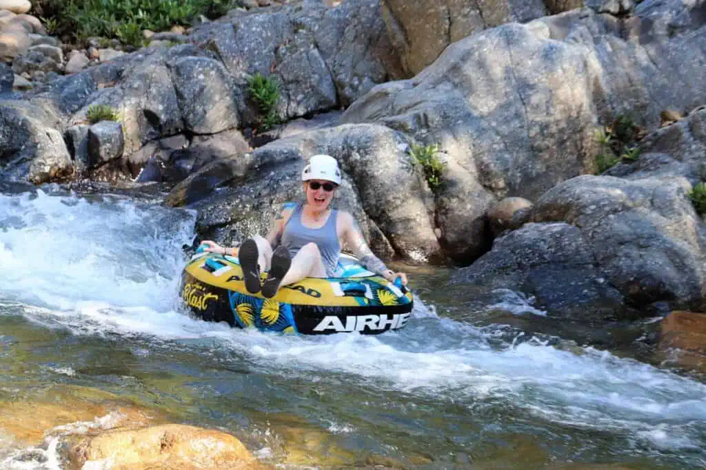 A woman rafting on a small tube