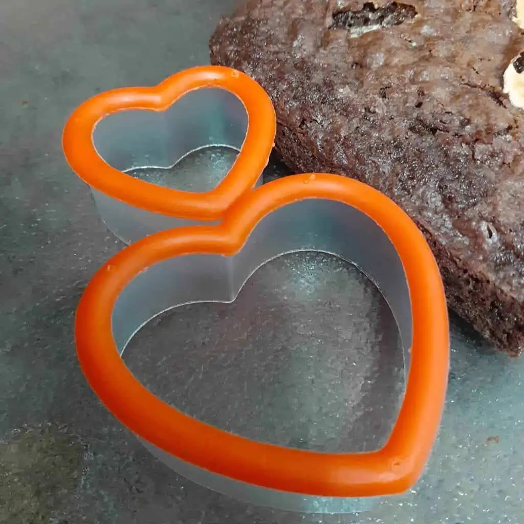 cookie cutters in the shape of a heart