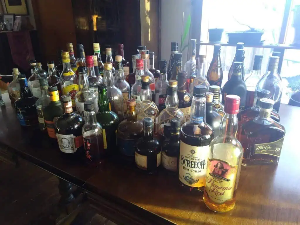 A cabinet of various spirits including Screech
