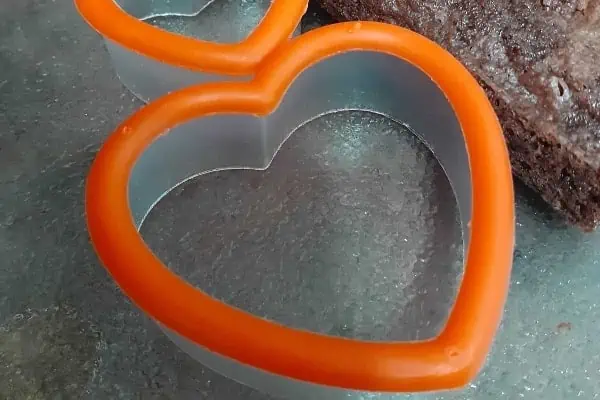 cookie cutters in the shape of a heart