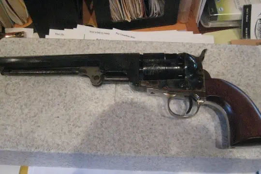 A black powder hand gun