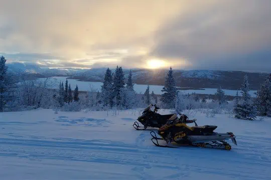 Taking a new Yukoner for a first snowmobile ride