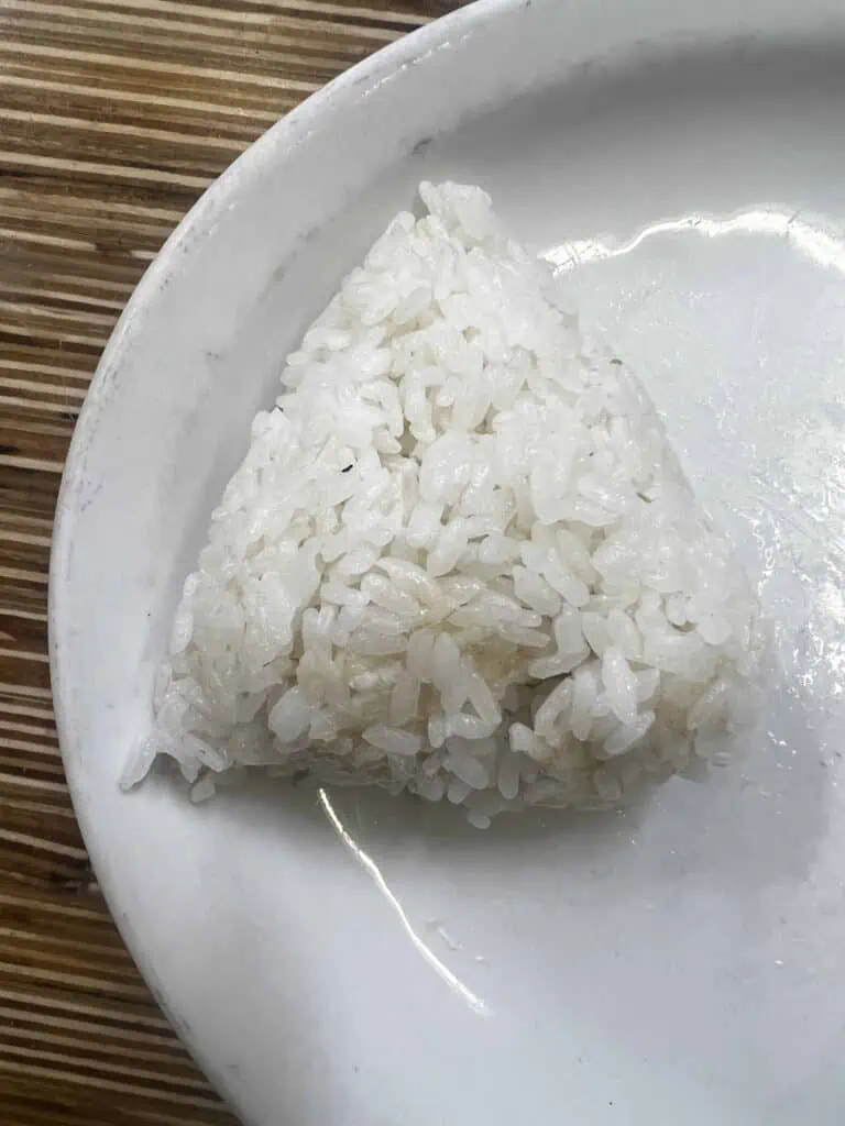 Wrap the rice around the tuna