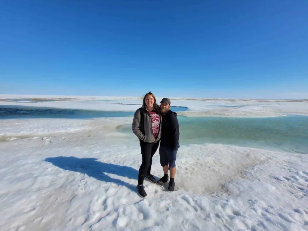 Nicola and Sam standing on the frozen Arctic Ocean, Deadhorse, Alaska